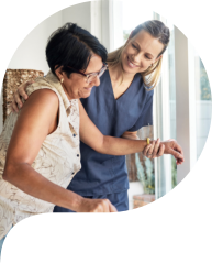 aide taking care the senior woman